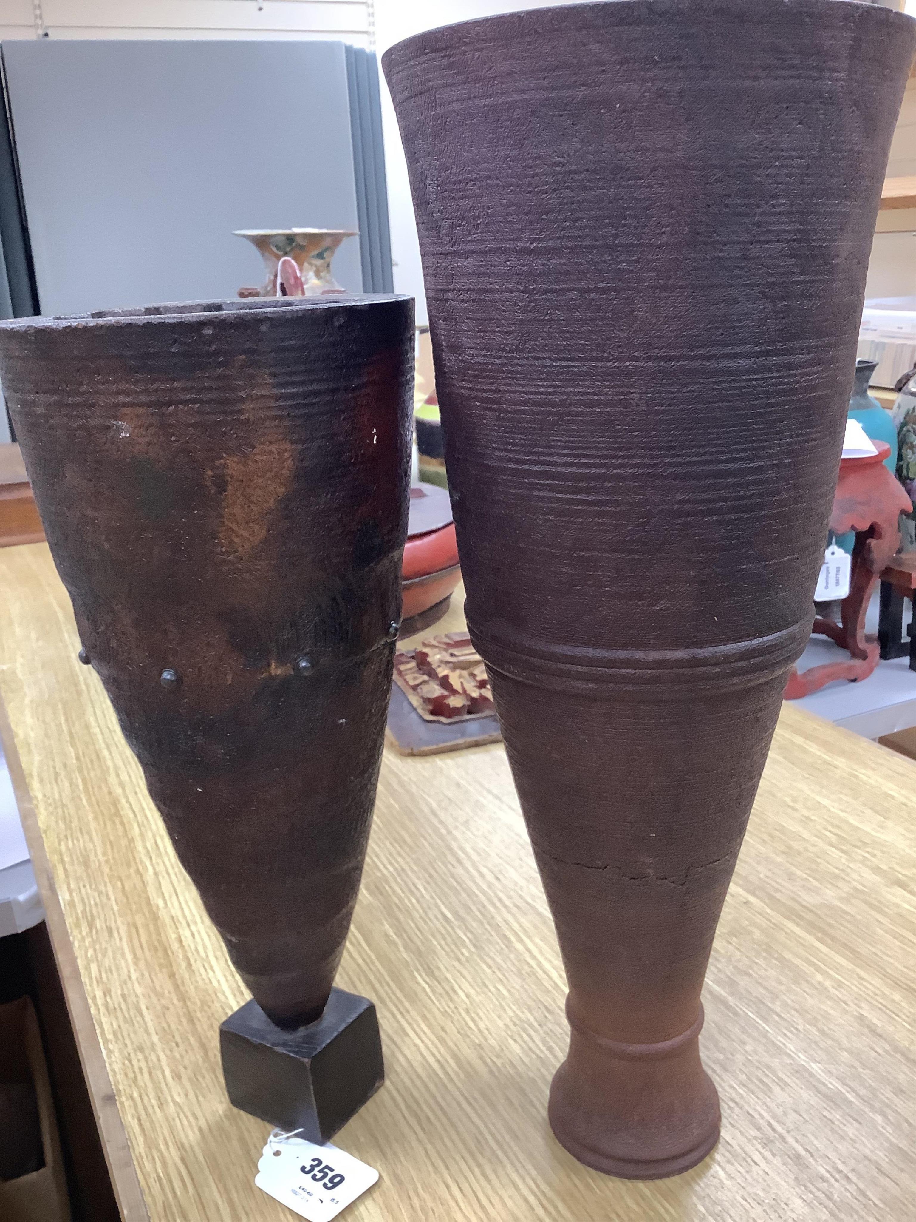 Two Mike Chai xanthorea vases, 45.5cm. Condition - fair